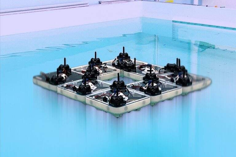 Tiny robot boats build floating structures Tiny robot boats build floating structures