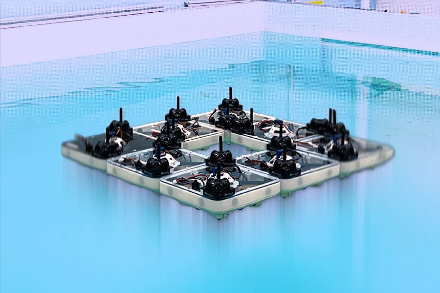 Tiny robot boats build floating structures Tiny robot boats build floating structures